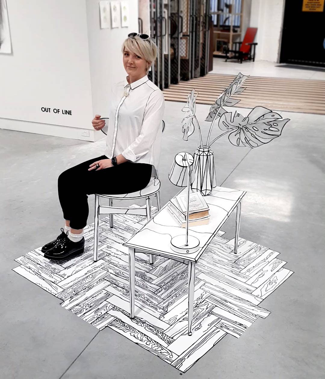 Anastasia Parmson sitting in her drawing installation